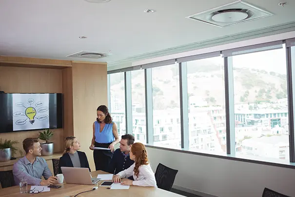 Ceiling microphone array and DSP equipment rack in a conference room