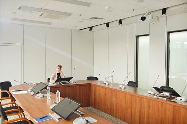Ceiling-mounted microphone array integrated into a conference room