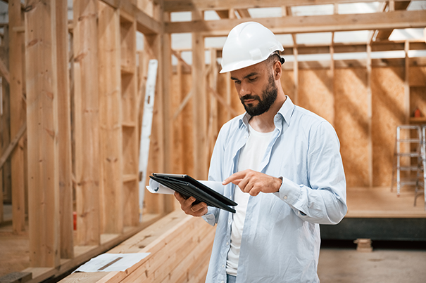 AV engineer conducting a room study and site evaluation before installation begins