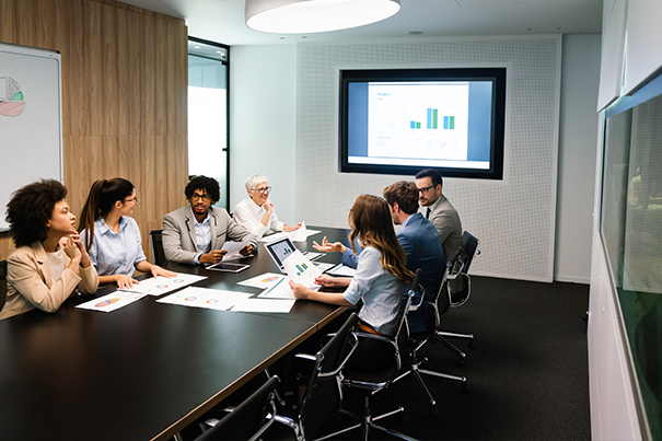 Executive boardroom with a wide front-of-room display for a Microsoft Teams Room